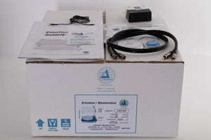 Box of a used ClearAudio Emotion Turntable with AT-VM95C Cartridge with Manual, Interconnects, Record Clamp, Spirit Level, Stylus Force Gauge, and Fitting Tools
