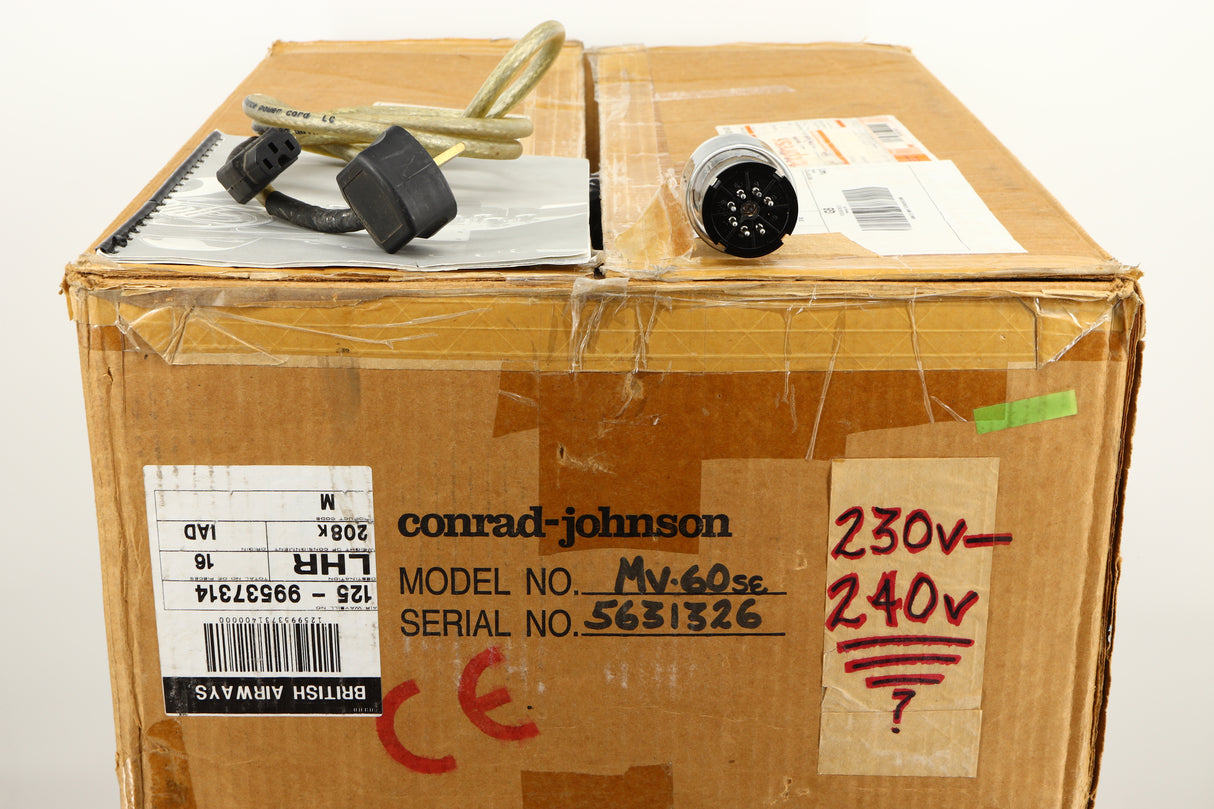 Box for a used Conrad Johnson MV60SE Power Amplifier showing Power Cable, Manual and Spare Valve