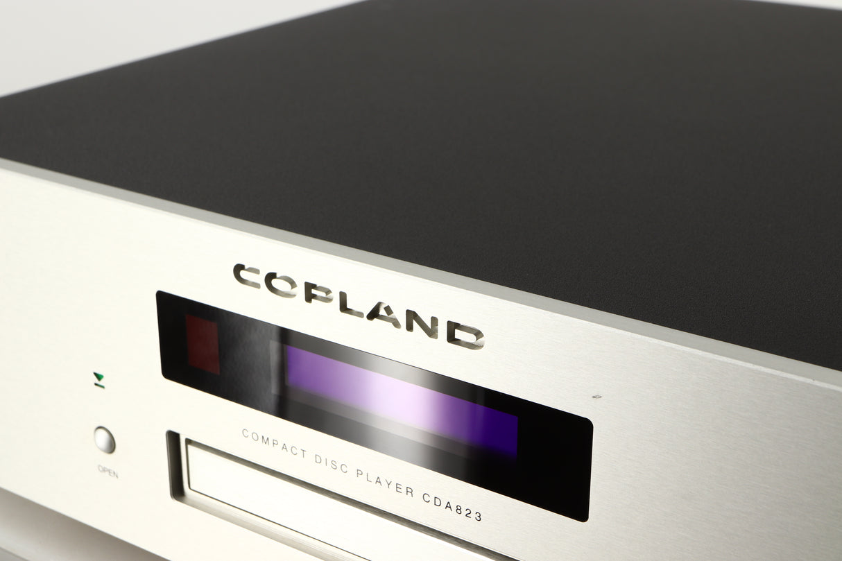 Close up of a used Copland CDA823 CD Player in a silver finish showing small scratch on fascia