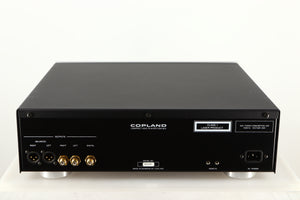 Rear view of a used Copland CDA823 CD Player in a silver finish showing Mains Input, XLR Outputs and Phono Outputs