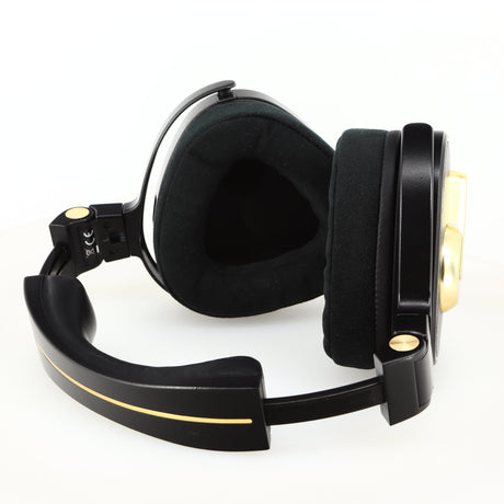 Close up of used Crosszone CZ-1 Headphones in a black / gold finish showing inside of left ear muff