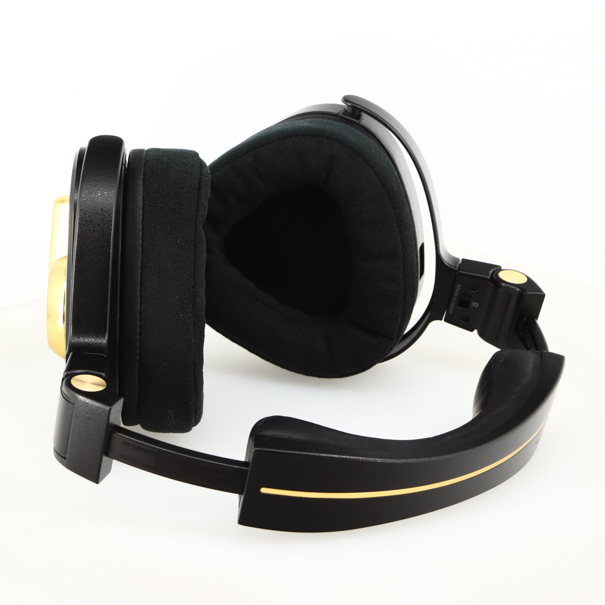 Close up of used Crosszone CZ-1 Headphones in a black / gold finish showing inside of right ear muff