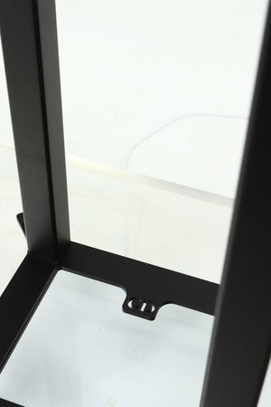 Close up of a used Custom Design QS104 Speaker Stand in a black finish showing the logo