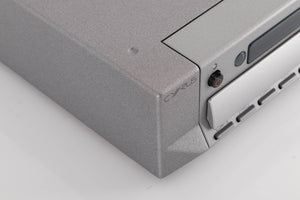Front left corner of a used Cyrus CD8X CD Player in a Quartz Silver finish