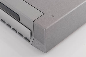 Front right corner of a used Cyrus CD8X CD Player in a Quartz Silver finish