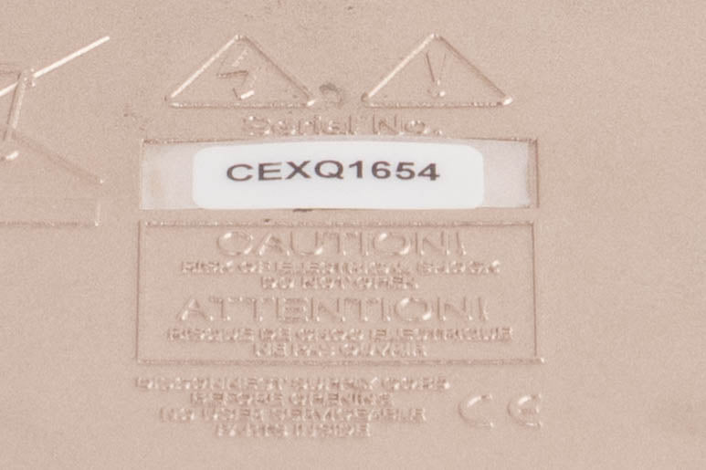Close up of a used Cyrus DAC X Digital Analogue Converter in a Quartz Silver finish showing serial number