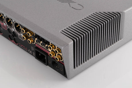Rear left corner of a used Cyrus DAC X Digital Analogue Converter in a Quartz Silver finish