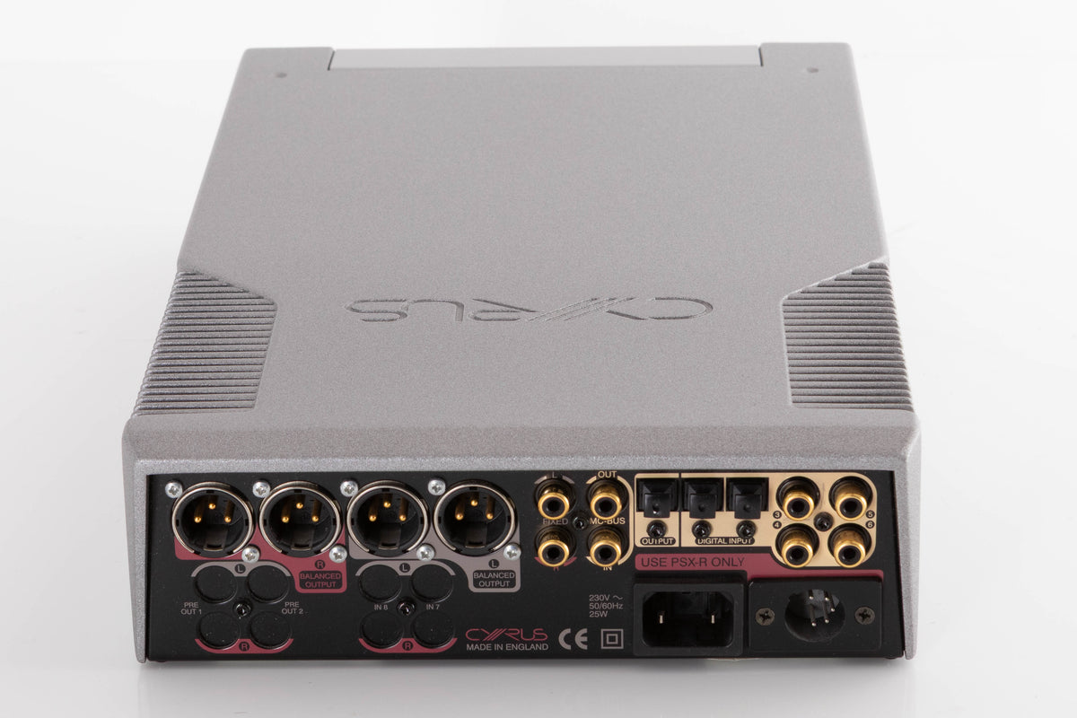 Rear view of a used Cyrus DAC X Digital Analogue Converter in a Quartz Silver finish showing Mains Input, Phono Inputs, Phono Outputs, Optical Inputs, Optical Output and XLR Outputs
