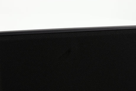 Close up of a used Cyrus ONE Linear Standmount Speaker in a gloss white finish showing small crease in the grille