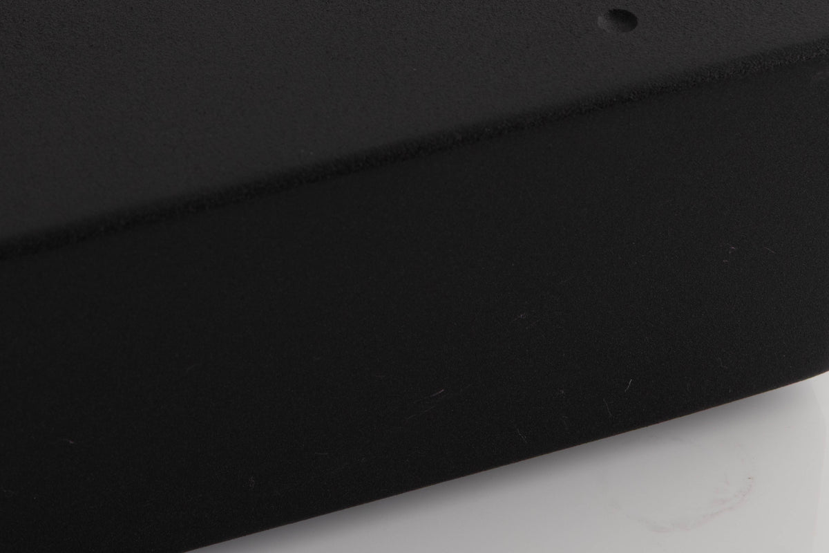 Close up of a used Cyrus Phono Signature Phonostage in a Brushed Black finish showing light scratches on left side