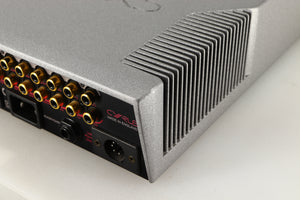 Rear left corner of a used Cyrus PRE VS2 Pre Amplifier in a quartz silver finish