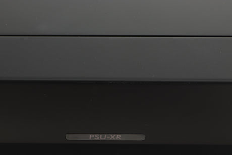 Close up view of a used Cyrus PSU-XR Power Supply in PhBlack finish showing a slight mark on the front edge