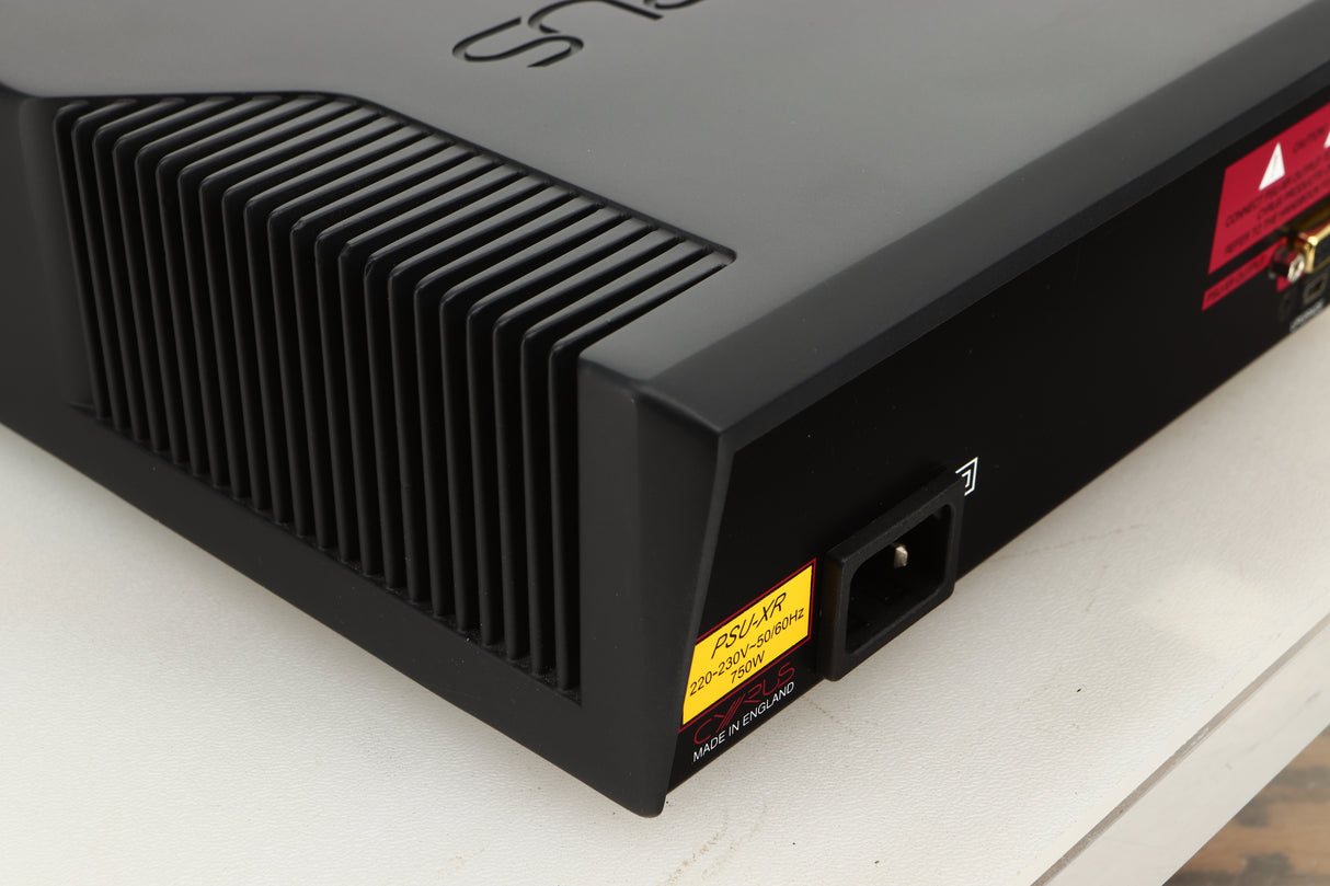 Rear left corner view of a used Cyrus PSU-XR Power Supply in PhBlack finish