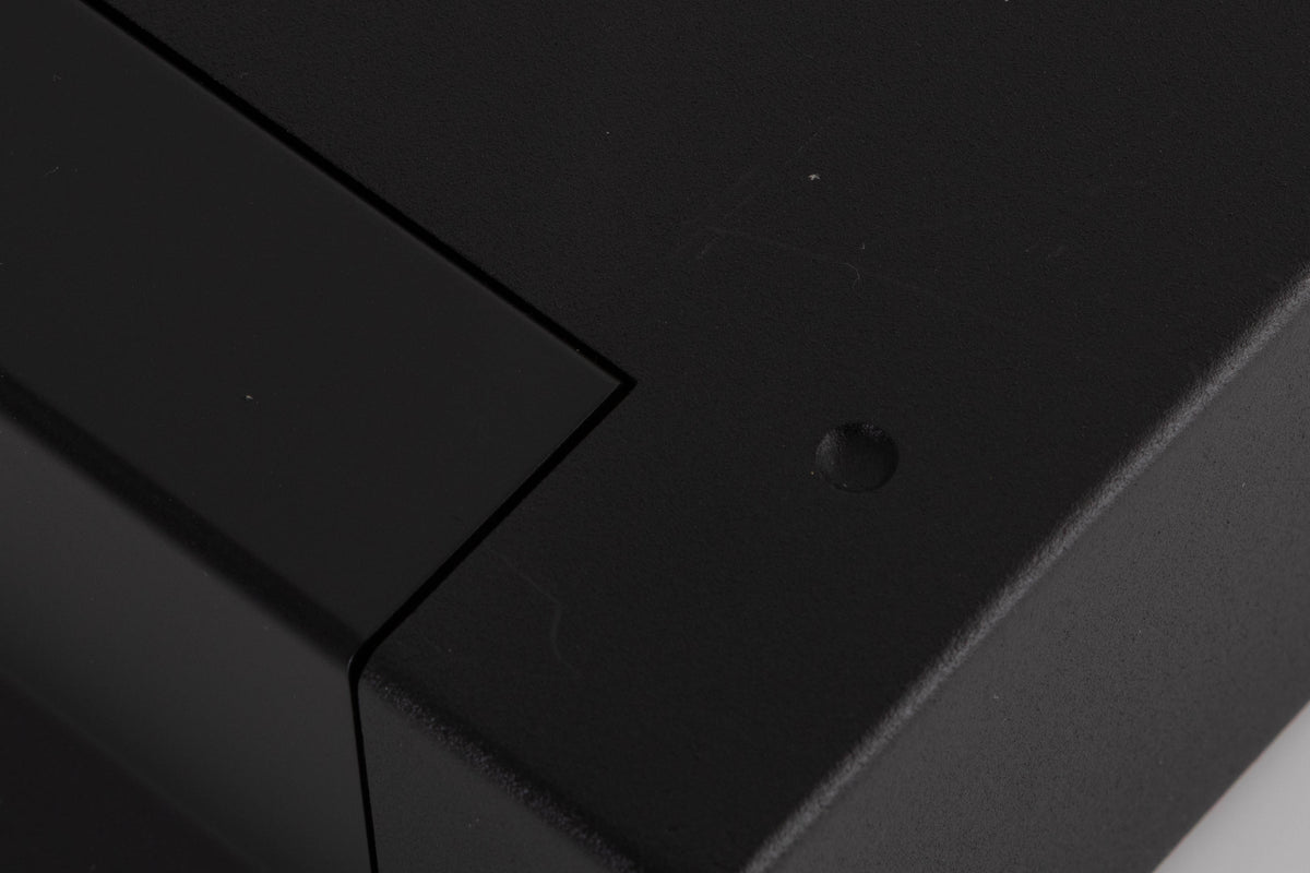 Close up of a used Cyrus PSX-R2 Power Supply in a Brushed Black finish showing scratches on top