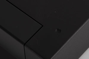Close up of a used Cyrus PSX-R2 Power Supply in a Brushed Black finish showing scratches on top