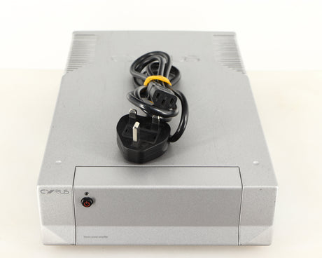 Top of a used Cyrus Q-Power Power Amplifier in a silver finish showing Mains Cable