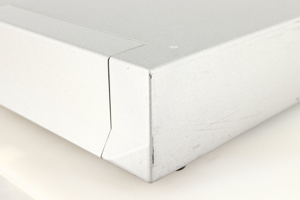Front right corner of a used Cyrus Q-Power Power Amplifier in a silver finish