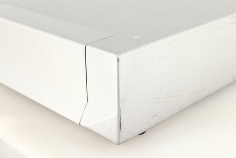 Front right corner of a used Cyrus Q-Power Power Amplifier in a silver finish