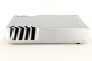 Left side view of a used Cyrus Q-Power Power Amplifier in a silver finish