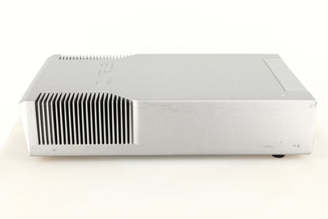 Left side view of a used Cyrus Q-Power Power Amplifier in a silver finish
