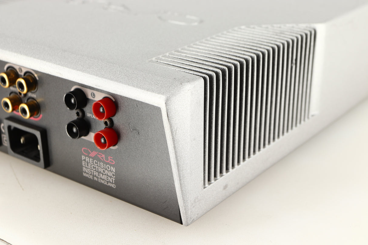 Rear left corner of a used Cyrus Q-Power Power Amplifier in a silver finish