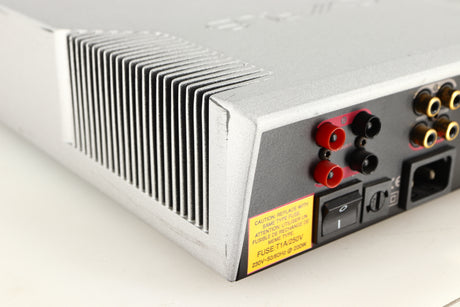 Rear right corner of a used Cyrus Q-Power Power Amplifier in a silver finish