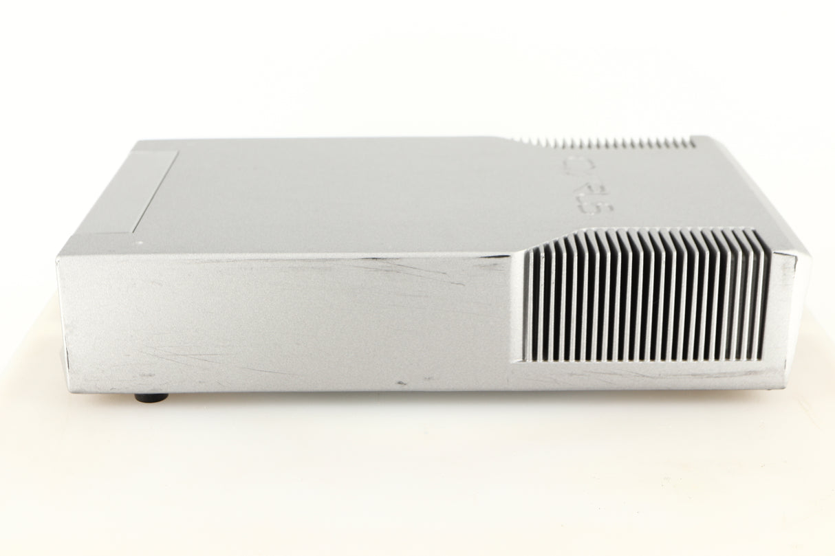 Right side view of a used Cyrus Q-Power Power Amplifier in a silver finish