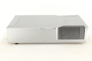 Right side view of a used Cyrus Q-Power Power Amplifier in a silver finish