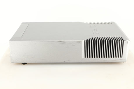 Right side view of a used Cyrus Q-Power Power Amplifier in a silver finish