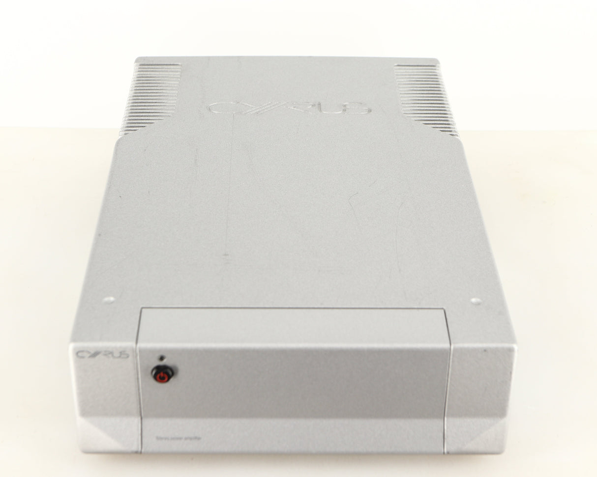 Top of a used Cyrus Q-Power Power Amplifier in a silver finish