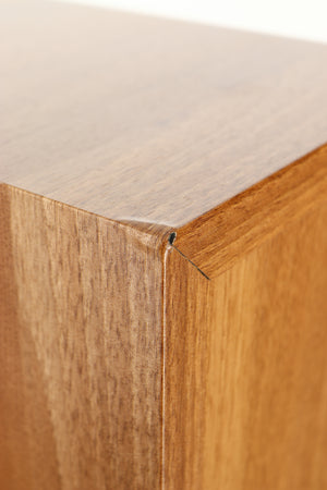 Close up of a used Dali Ikon 5 Floorstanding Speaker in an oak finish showing damage on rear right corner