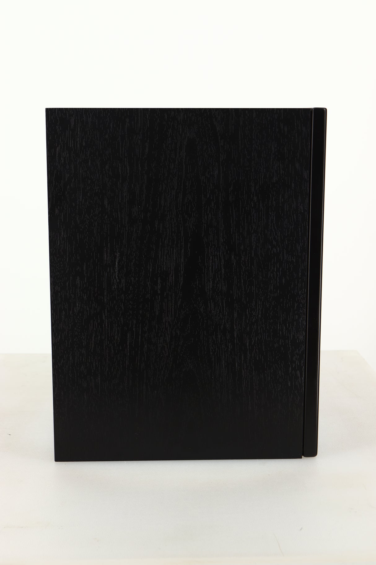 Side view of a used Dali Oberon 1C Active Standmount Speaker in Black finish