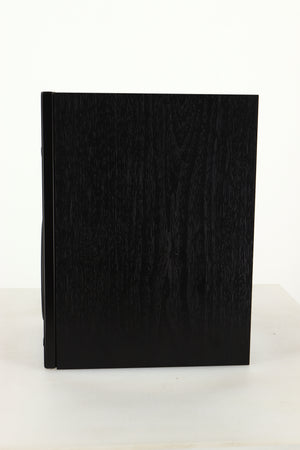 Side view of a used Dali Oberon 1C Active Standmount Speaker in Black finish