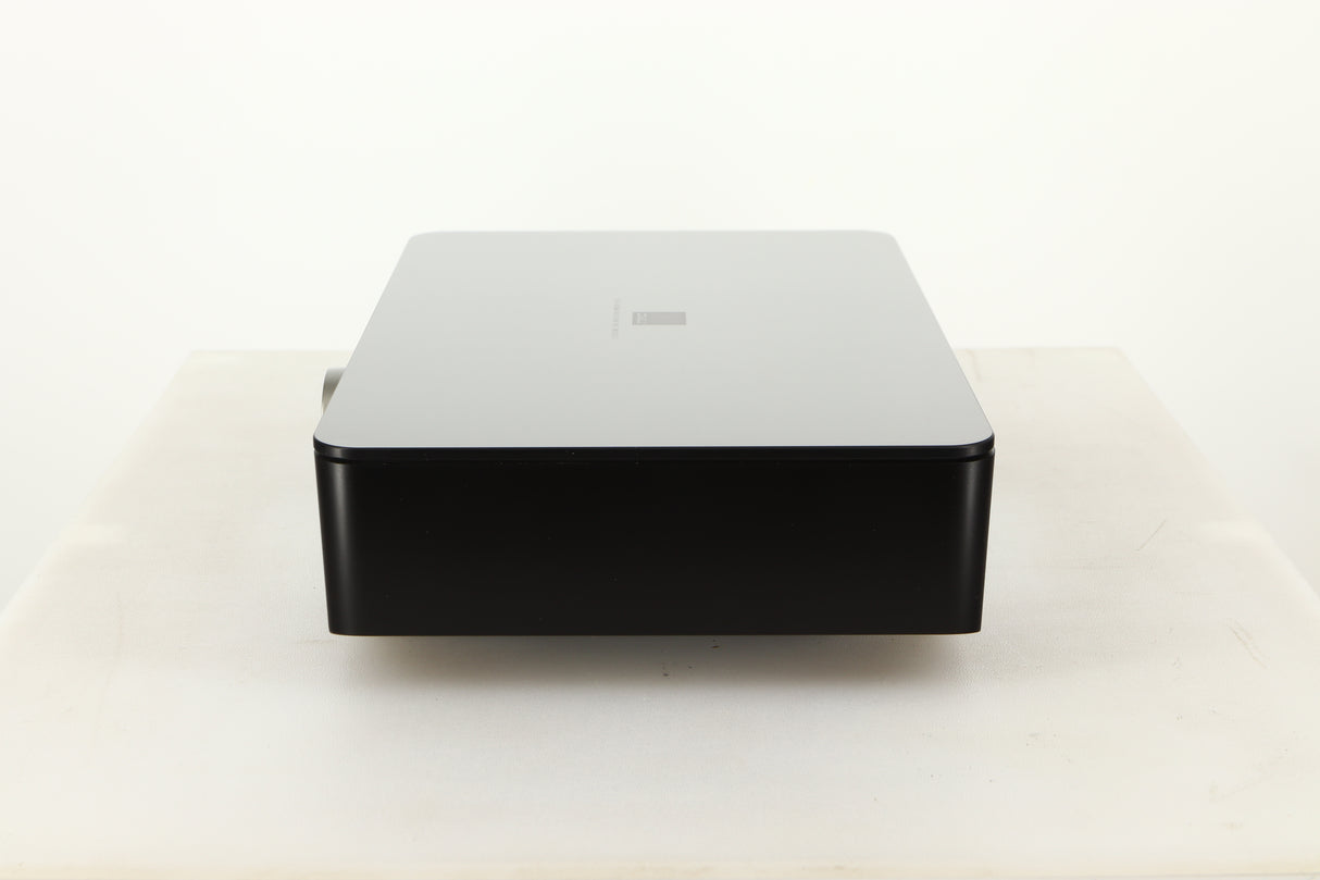 Side view of a used Dali Hub in Black finish