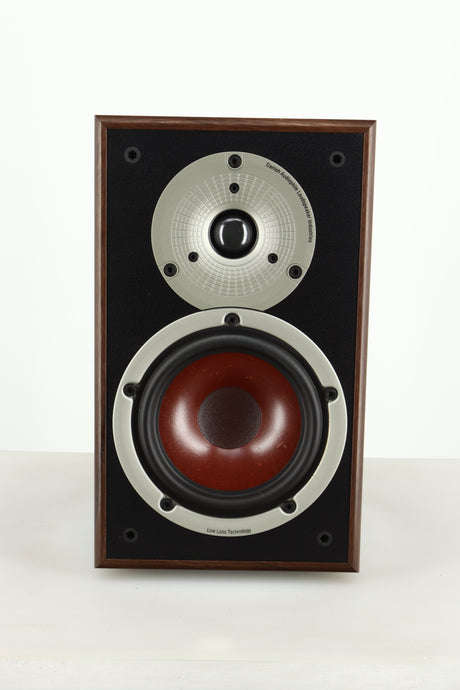 Front view of a used Dali Spektor 2 Standmount Speaker in Walnut