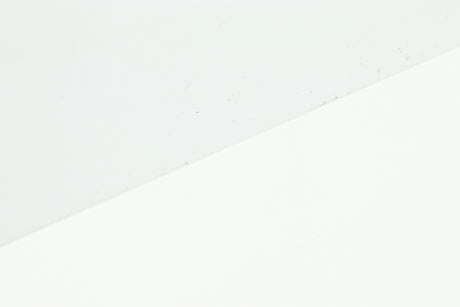 Close up of a used Dali Zensor 3 Standmount Speaker in a satin white finish showing some scratching