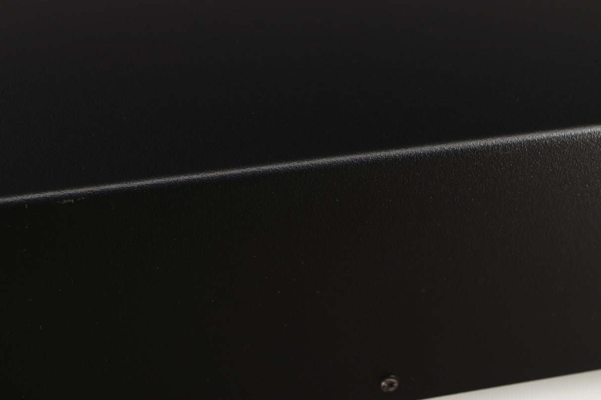 Close up of a used Deco Audio Curve MM Phonostage in a black finish showing scratched on right edge