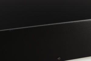 Close up of a used Deco Audio Curve MM Phonostage in a black finish showing scratched on right edge