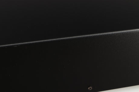 Close up of a used Deco Audio Curve MM Phonostage in a black finish showing scratched on right edge