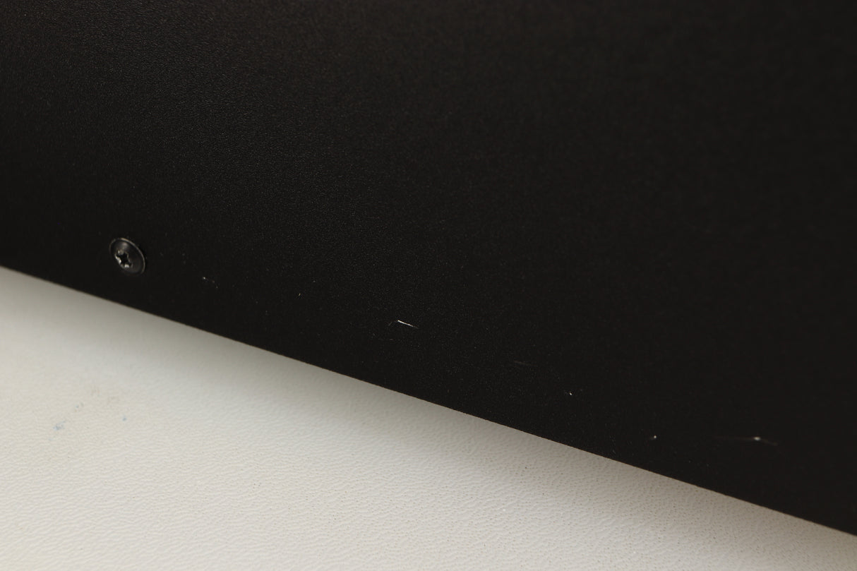 Close up of a used Deco Audio Transfer DAC in a black finish showing scratching on right side