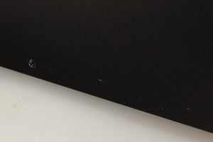 Close up of a used Deco Audio Transfer DAC in a black finish showing scratching on right side