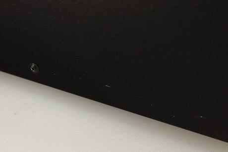 Close up of a used Deco Audio Transfer DAC in a black finish showing scratching on right side