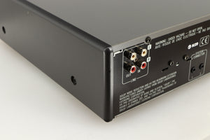 Rear right corner of a used Denon DDR-6.5 Cassette Deck in a silver finish