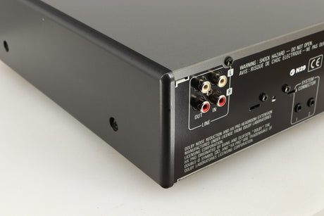 Rear right corner of a used Denon DDR-6.5 Cassette Deck in a silver finish