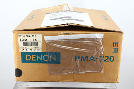 Box of a used Denon PMA-720 Integrated Amplifier in Black finish showing manual
