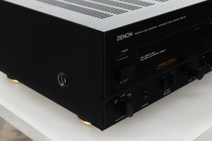 Front left corner view of a used Denon PMA-720 Integrated Amplifier in Black finish 