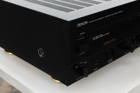 Front left corner view of a used Denon PMA-720 Integrated Amplifier in Black finish 