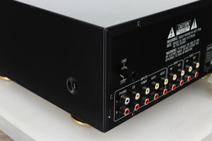 Rear left corner view of a used Denon PMA-720 Integrated Amplifier in Black finish 