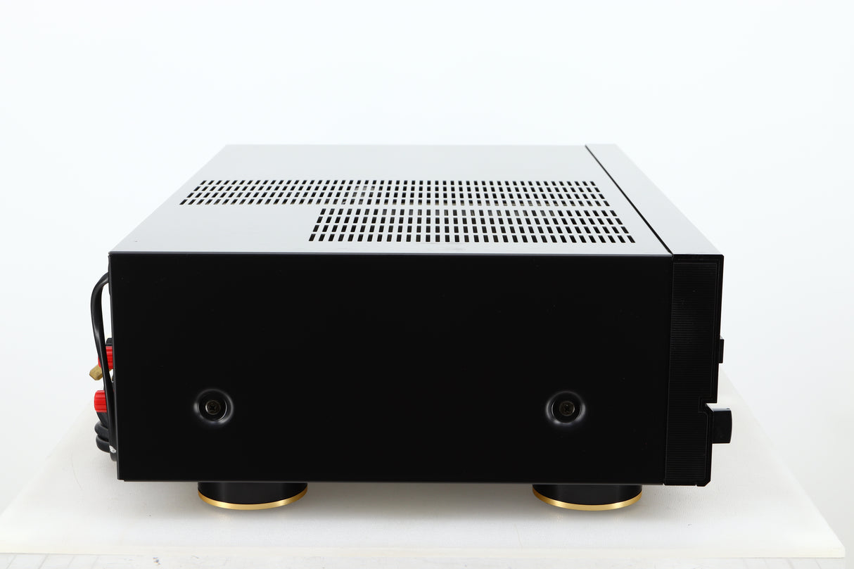 Side view of a used Denon PMA-720 Integrated Amplifier in Black finish 
