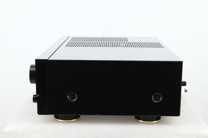 Side view of a used Denon PMA-720 Integrated Amplifier in Black finish 
